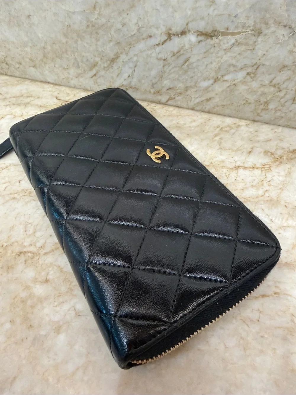 CHANEL Black Quilted Zip-Around Wallet with Gold CC